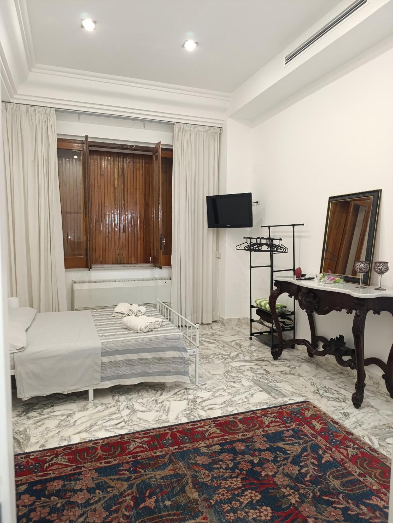 Don Camillo Suites 리포스토 객실 사진